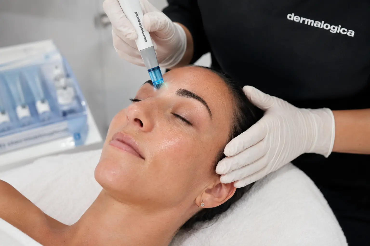 Client receiving professional exosome skin treatment at Ethos Skin and Laser Clinic in Surrey